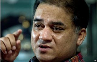 In this 4 Feb 2013 file photo, Ilham Tohti, an outspoken scholar of China's Uighur minority, speaks during an interview at his home in Beijing, China.