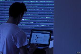 Man using Facebook
