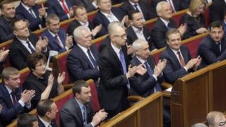 Lawmakers applaud after re-electing Arseny Yatsenyuk as prime minister, 27 November 2014