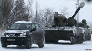 Russian armour on a road in rebel-held eastern Ukraine