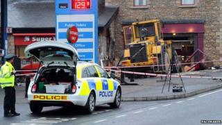 Digger rammed into cash machine