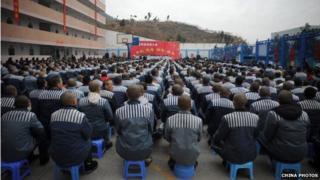 Inmates attend a ceremony to celebrate the upcoming Spring Festival at the Chuanxi Prison on January 24, 2009 in Chengdu of Sichuan Province, China.