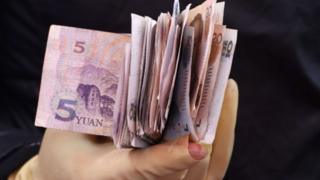 Archive picture shows Yuan banknotes
