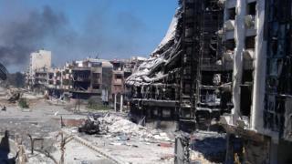 Badly damaged buildings in Homs, Syria