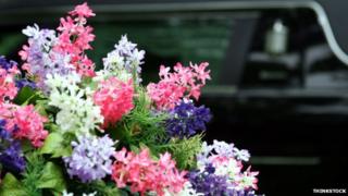 Hearse and flowers