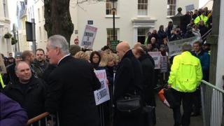 Protestors outside the Guernsey States building