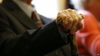 Elderly man with stick