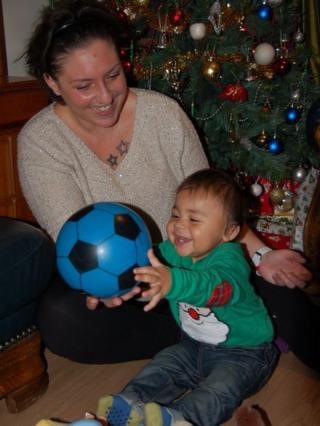 Samantha and baby and Christmas tree