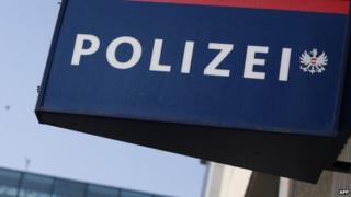 This picture taken in Vienna on September 6, 2012 shows a sign of the Polizei, Austria's Police department.