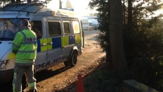 Fire officer and police van