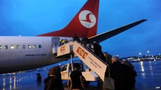 Passengers get into a Turkish Airlines aircraft in March 2013 at the Ataturk Airport in Istanbul