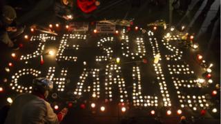 Candle light vigil in central Paris