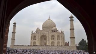 Indian Muslims offer Eid al-Fitr prayer at Shahi Masjid at the famous Taj Mahal, in Agra, India, Monday, Aug. 20, 2012.