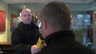 Individual being breath tested for alcohol levels at club in York