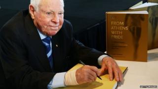 Harry Gordon signing copies of his book, 2014