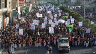 Followers of the Houthi movement march in the Yemeni capital on 23 January 2015