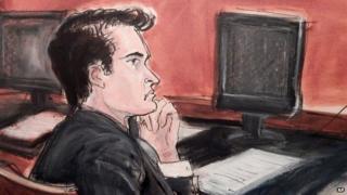 Ross William Ulbricht listens to proceedings from the defense table during opening arguments in his criminal trial in New York 13 January 2015