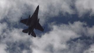Jordanian fighter jet over village of Aya