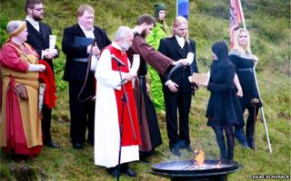 High priest of the Asatru Association, Hilmar Orn Hilmarsson, leads a ceremony at the Pingvellir National Park near Reykjavik in June 2012.