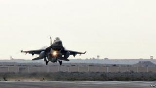 Egyptian air force fighter after air strike in Libya (16 Feb) - Egyptian defence ministry handout