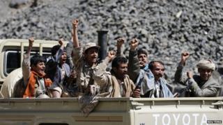 Houthi rebels ride a truck in Sanaa on 15 February 15