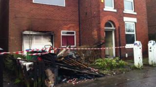The fire damaged house