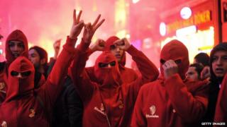 Protesters shout slogans and gesture during a protest against Turkish government's newly proposed restrictions on the use of internet, on Istiklal avenue in Istanbul, on February 8, 2014