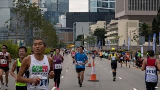 Competitors run in Hong Kong"s first inner city ultra marathon on March 1, 2015