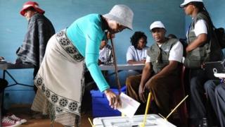 A voter casts her ballot in Maseru, Lesotho, Saturday 28 February 2015