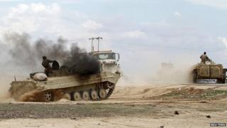 Iraqi soldiers in armoured vehicles in Salahuddin province. 4 March 2015