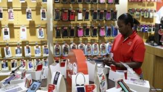 Female worker in Johannesburg South Africa in Vodacom shop
