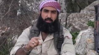 A screen grab of Abu Homam al-Shami taken from an al-Nusra Front video made in March 2014