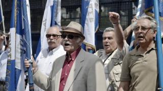 group of elderly German and Greek protesters