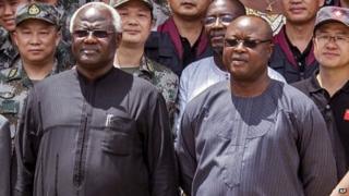 Sierra Leone' President Ernest Bai Koroma (left) and Vice-President Samuel Sam-Sumana at the opening ceremony of the China Friendship Hospital for Ebola patients in Freetown - 25 September 2015