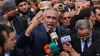 Omar al-Hassi speaks during the funeral for slain Fajr Libya leader Saleh Al-Baraki at Martyrs" Square in Tripoli , Libya, 22 March 2015.