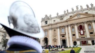 Pope Francis delivers his "Urbi et Orbi" blessing message from the central balcony of St Peter's Basilica at the end of the Easter Mass 5 April 2015