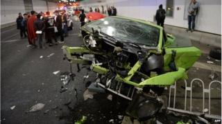 Damaged Lamborghini car and debris in a tunnel in Beijing (12 April 2015)