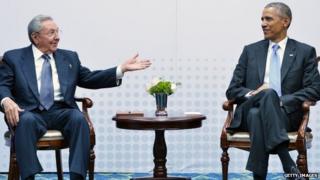 Cuba"s President Raul Castro (L) speaks during a meeting with US President Barack Obama on the sidelines of the Summit of the Americas at the ATLAPA Convention center on April 11, 2015 in Panama City.
