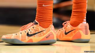 An Oregon State Beavers basketball player wearing Nike shoes
