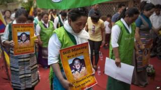 Members of the exiled Tibetan Women Association protest to demand the immediate release of Gedhun Choekyi Nyima, the 11th Panchen Lama, during a gathering to mark the 20th anniversary of his disappearance, in Delhi, India (17 May 2015)