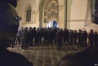 Over 100 Croatian war veterans have taken refuge inside a church after police disrupted their anti-government protest in central Zagreb.