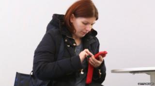 Woman using mobile phone
