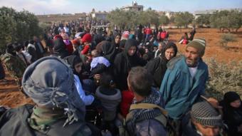 Syrian residents flee violence in south-western outskirts of Aleppo on 8 December 2016