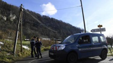 French Gendarmes block the access to Saint-Franc, in the Eastern French region of Savoie on February 14, 2018