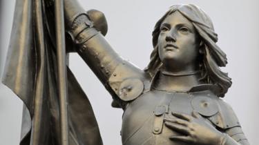 A statue of Joan of Arc outside the Front National headquarters in Nanterre.