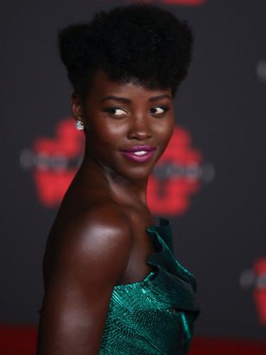 Kenyan-Mexican actress Lupita Nyong"o poses on the red carpet during the world premiere of "Star Wars: The Last Jedi" at the Shrine Auditorium in Los Angeles, California, USA, 09 December 2017. Nyong"o plays the role of Maz Kanata in the film.