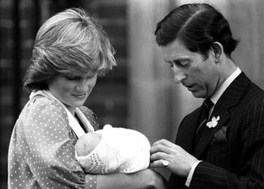Prince and Princess of Wales showing off their son, Prince William, to the media for the first time