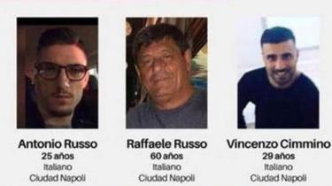 A missing poster shows the photos of the three Italians who disappeared in Mexico