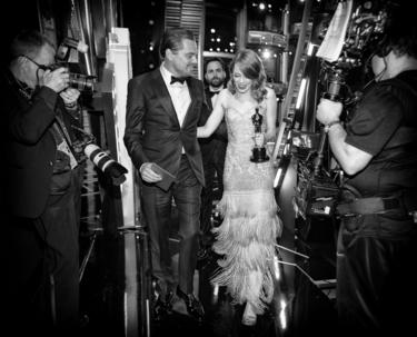 Leonardo DiCaprio and Emma Stone backstage.