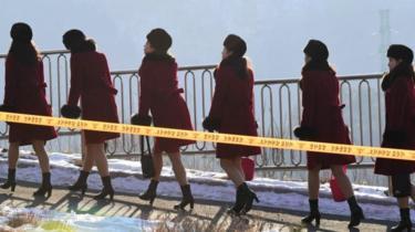 North Korean cheerleaders arrive at their accommodation near Pyeongchang, South Korea